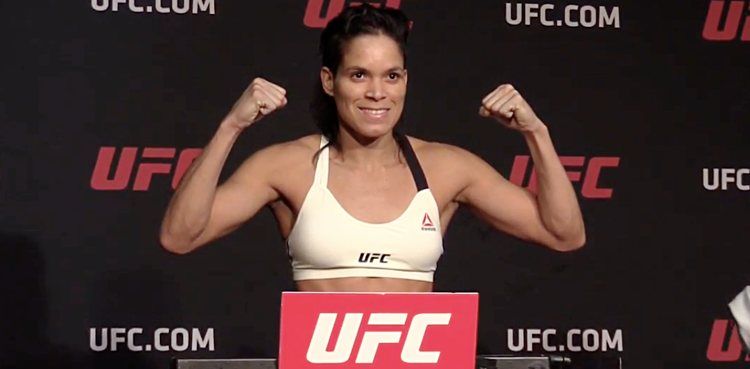 Amanda-Nunes-UFC-207-on-scale